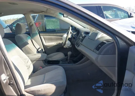 2003 Toyota Camry Le from USA, damaged, VIN 4T1BE32K33U741780